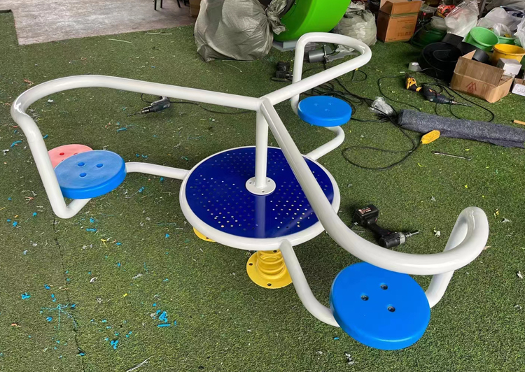 High-quality children's spring seesaw with safety guards, designed for outdoor playground equipment.